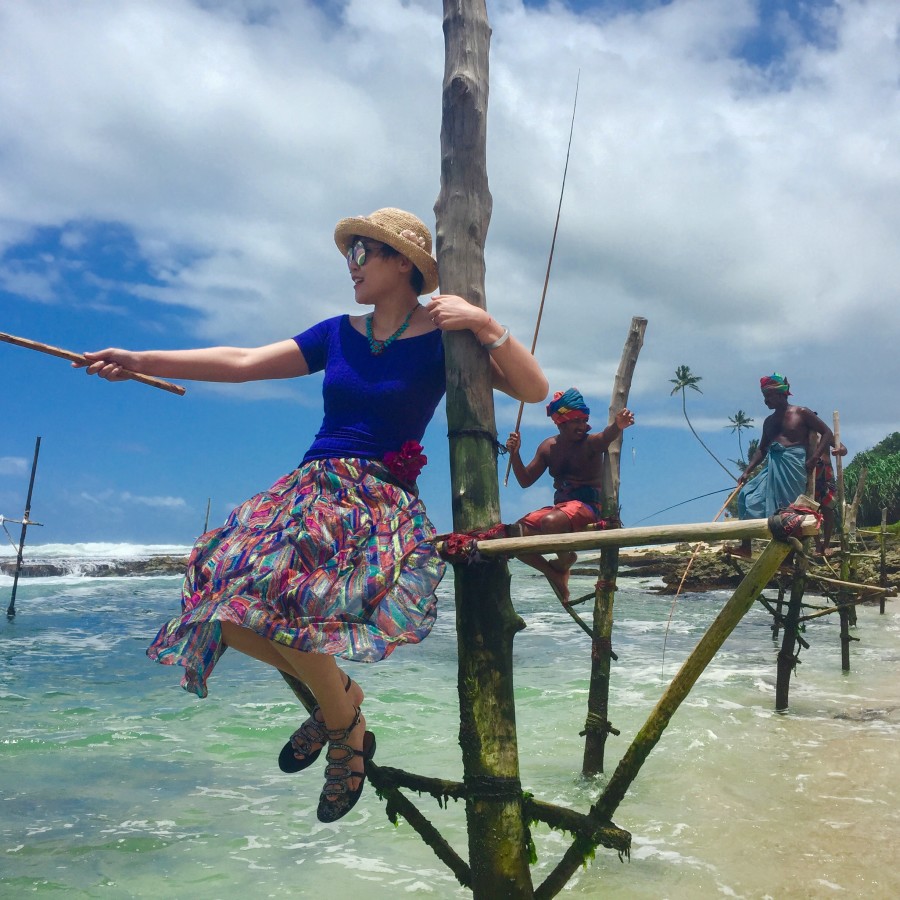 alt-text woman taking a selfie on a beach