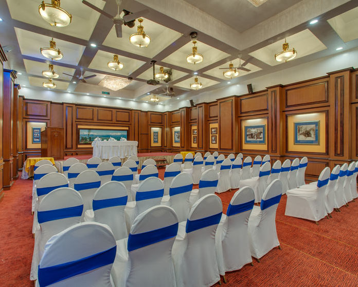 indoor seating space at the banquet hall - Mayfair Hill Resort, Darjeeling 4