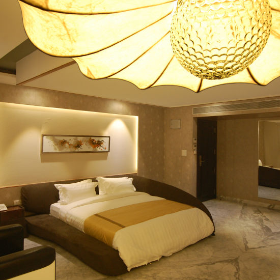 alt-text Click Hotel Sapphire Star diamond rooms with bed and other amenities 