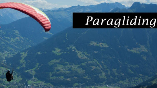 Paragliding against the backdrop of hills