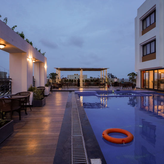 overview of the swimming pool with Shanti Seaview Resort & Spa on the right hand side