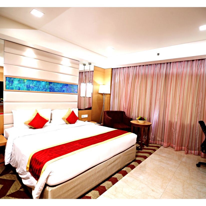 a king size bed offered at Premium Room in Vizag