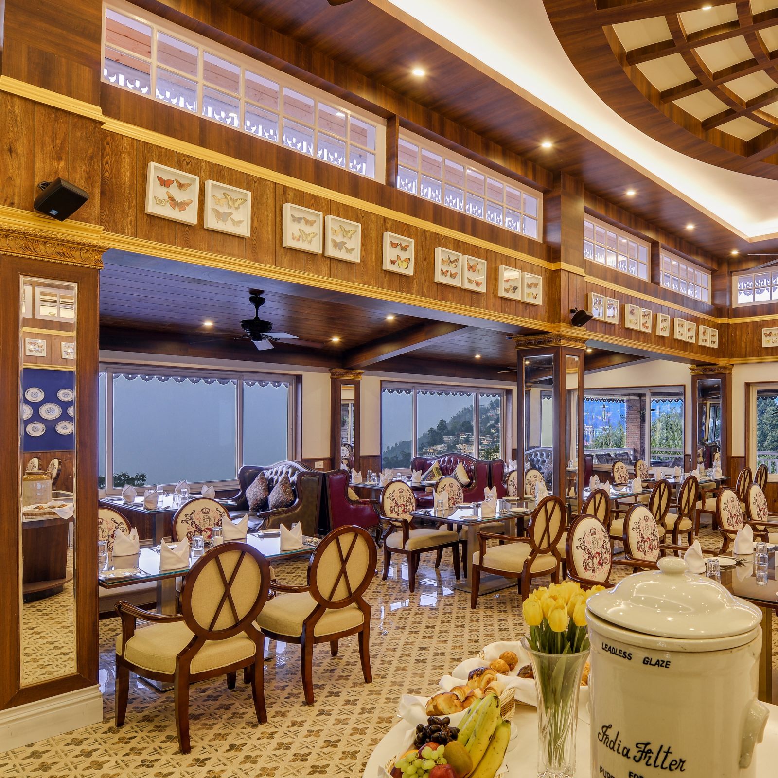 the indoor seating space of a restaurant - 5 star spa resort in kalimpong-Mayfair Himalayan Spa Resort Kalimpong