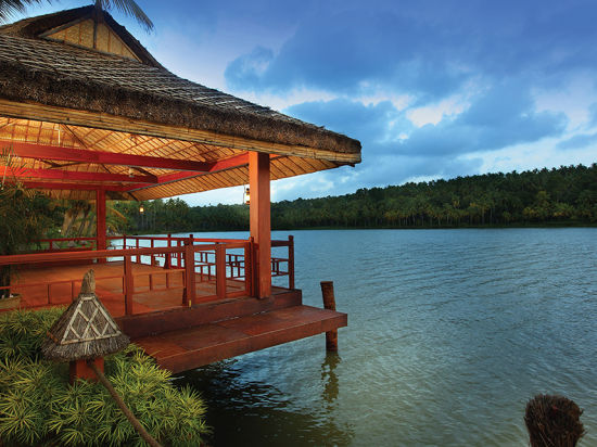 A beautiful gazebo made on the top of a lake near hotel Fragrant Nature Kollam Boat Jetty