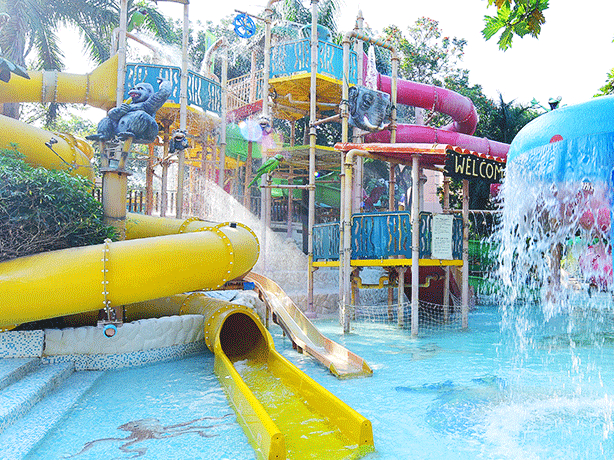 Water Kingdom - view of the WATERFALLS UMBRELLAS ELEPHANT TILTING BUCKET at our water park