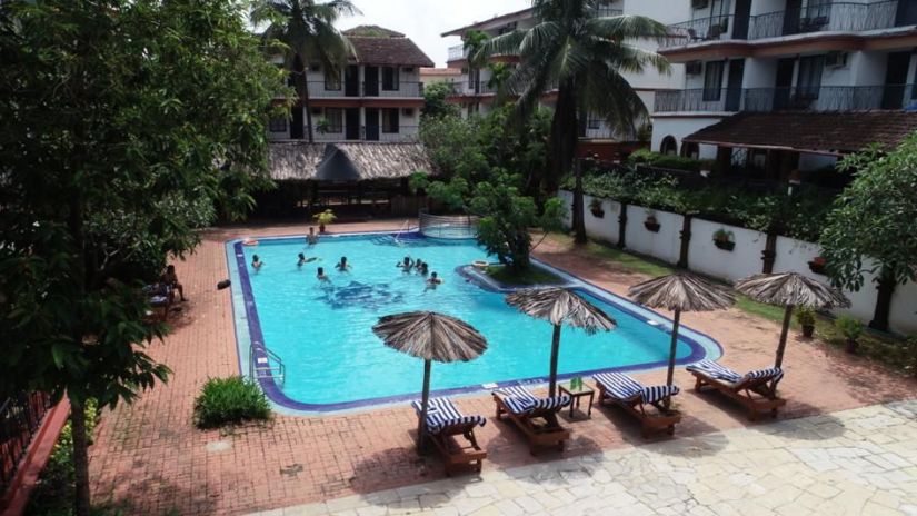 View of the swimming pool at Pride Sun Village Resort and Spa, Goa