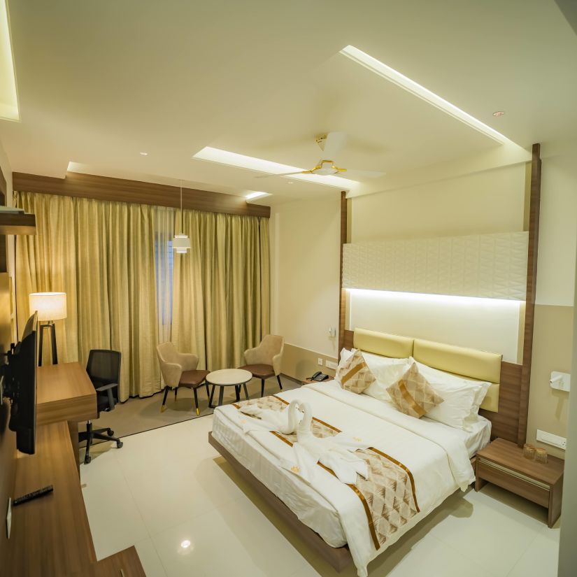 A full view of Deluxe Double Bed in Executive Room at Kyriad Prestige, Ilkal