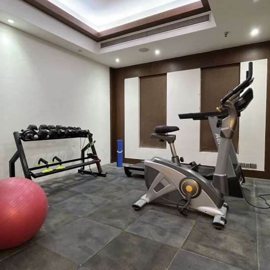 gym area of a hotel with modern gym equipments for fitness -Yuhi Mansions2