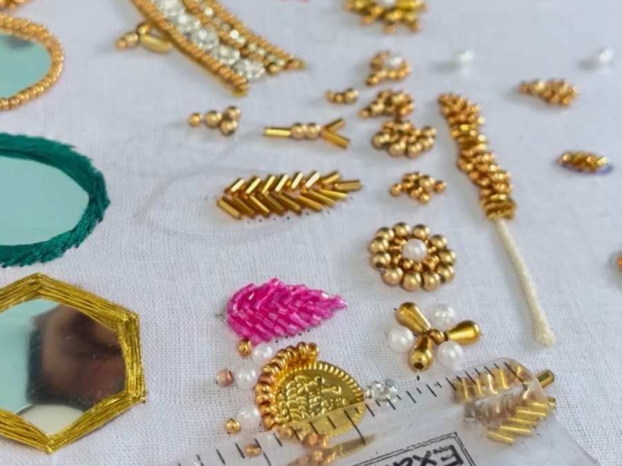 Student learning Aari embroidery at SIRA