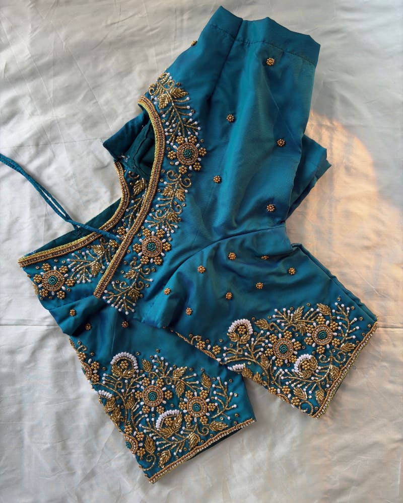 Teal Aari embroidery blouse with gold and pearl floral border, by SIRA
