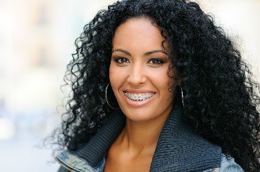 Lady With Braces Smiling