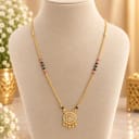 Elegant Gold Plated American Diamond Mangalsutra with Black Beads — view 1