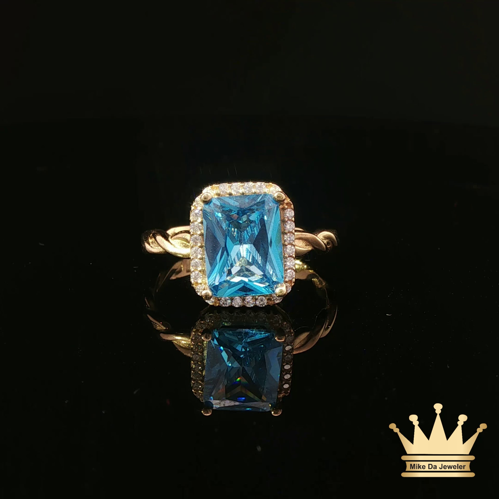 14K Yellow Gold Rope Style Ring with Blue Cubic Zirconia Halo