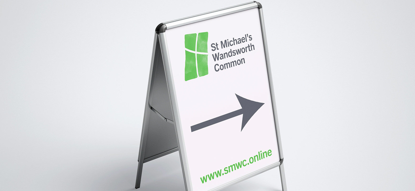 An A-frame sign board to welcome people to the church building.