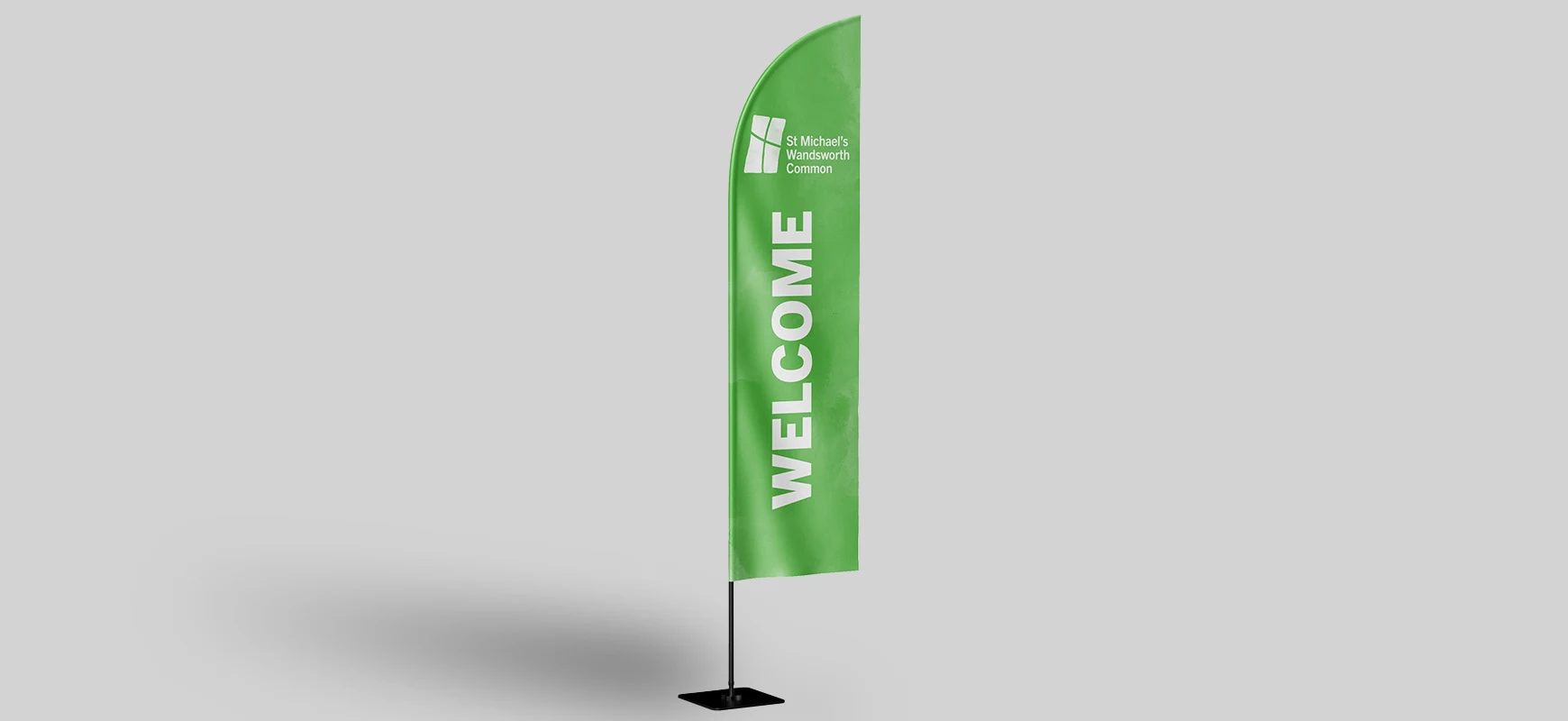 Large green feather banner for welcoming people to St Michael's Wandsworth Common