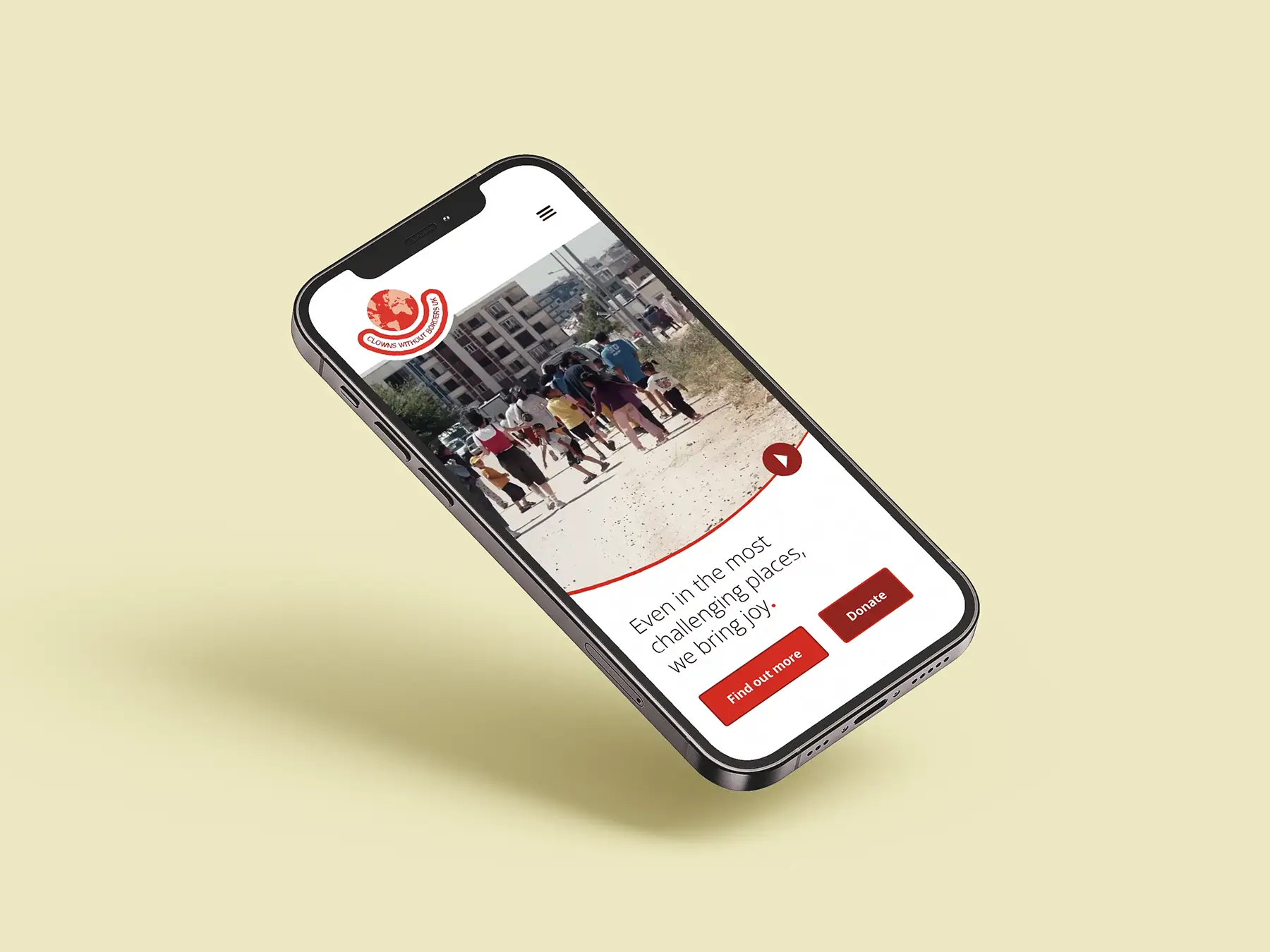 A screenshot of the Clowns Without Borders homepage on an iPhone 12