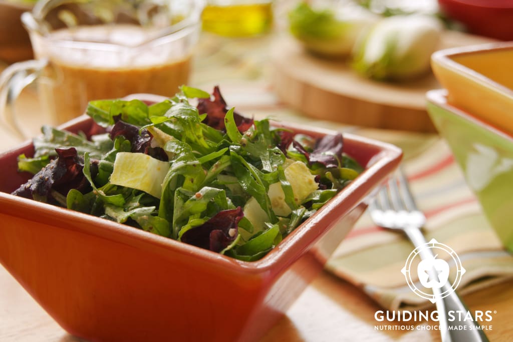 Mixed green salad with mustard dressing