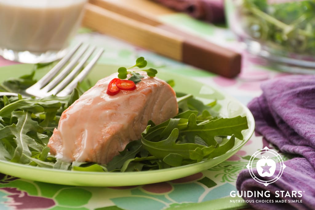 Poached Coconut Salmon Over Greens