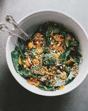 Baby Kale Salad w/ Quick Pickled Kumquats, Crispy Crumbs & Herby Vinaigrette