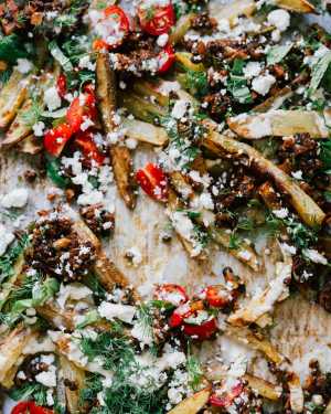 Oven Fries w/ Spiced Lentils, Tomatoes & Tahini Drizzle