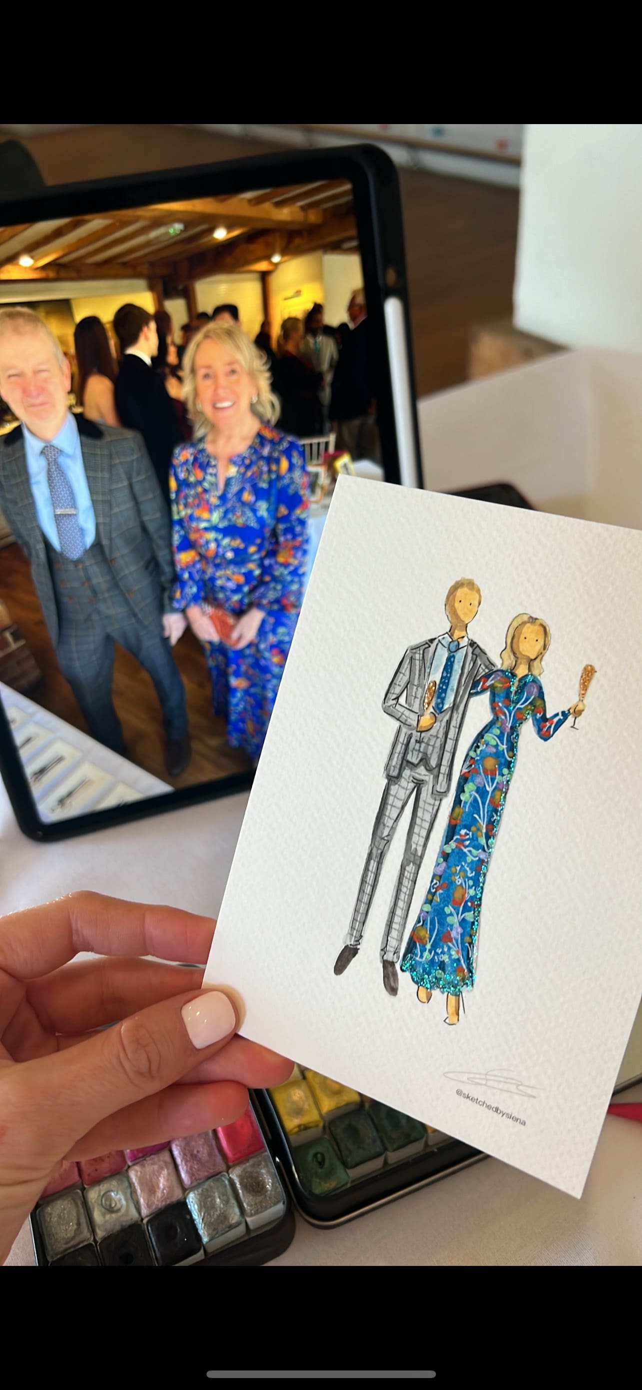 Painting of a couple at a wedding