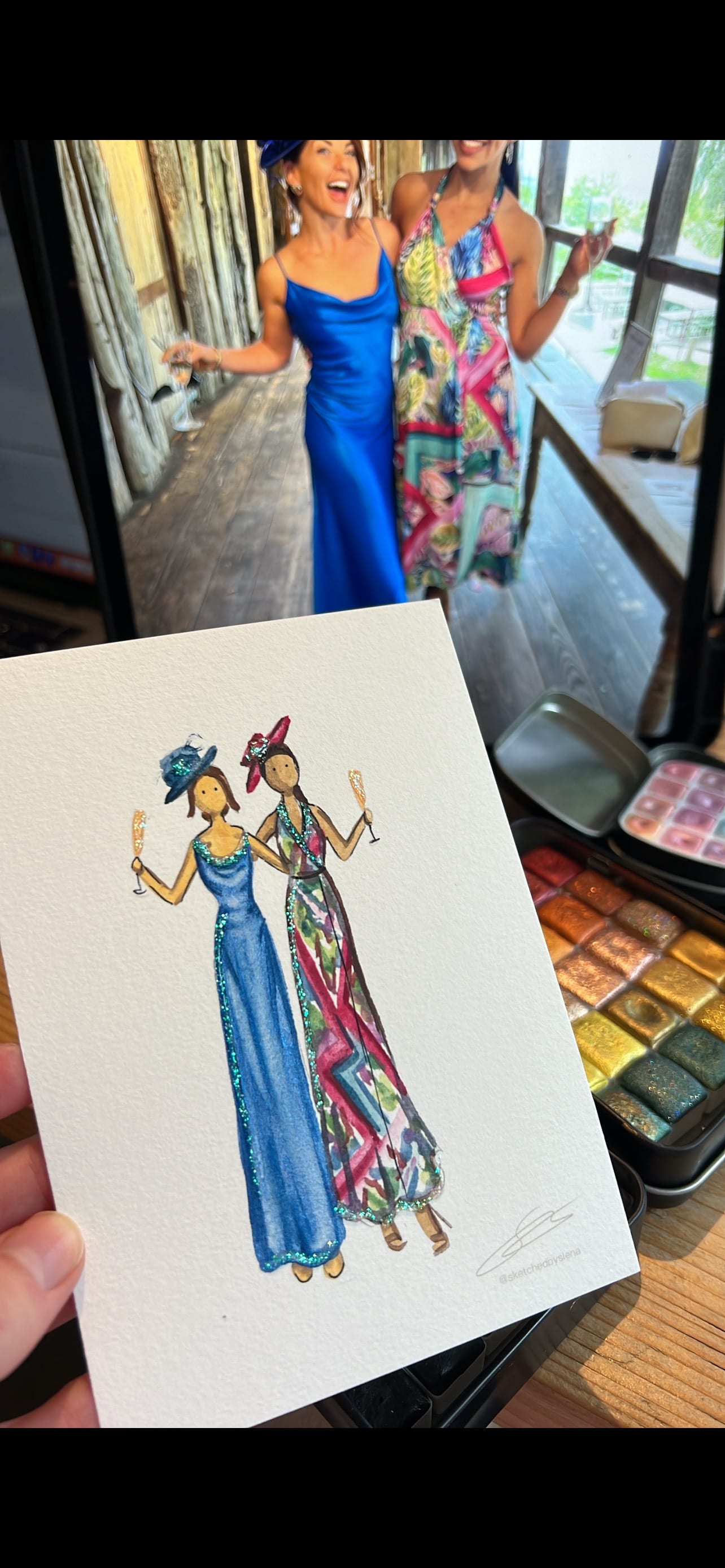 Paintings of two ladies at a wedding