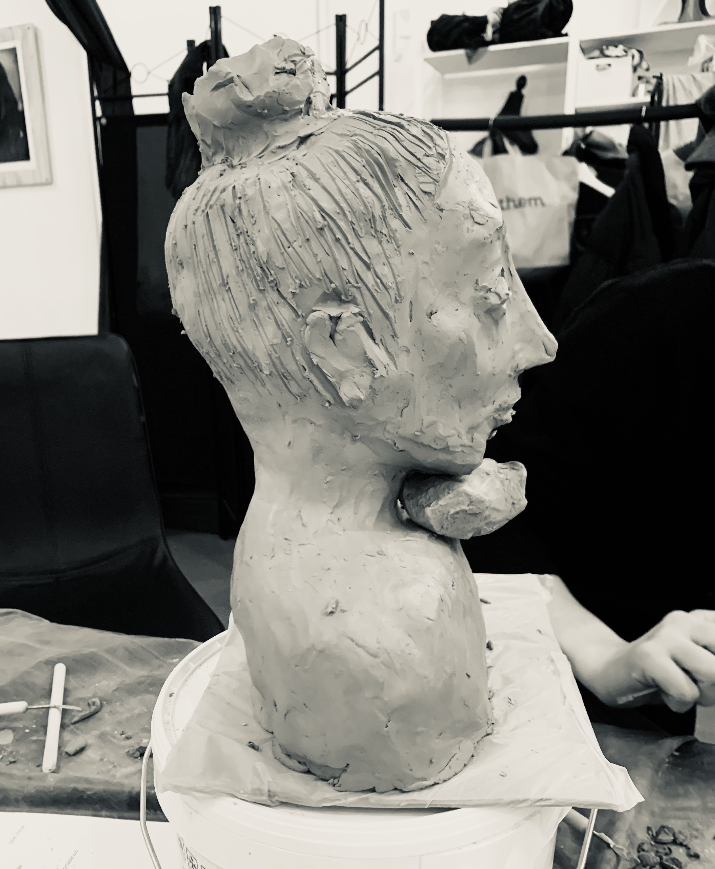 clay sculptures of faces