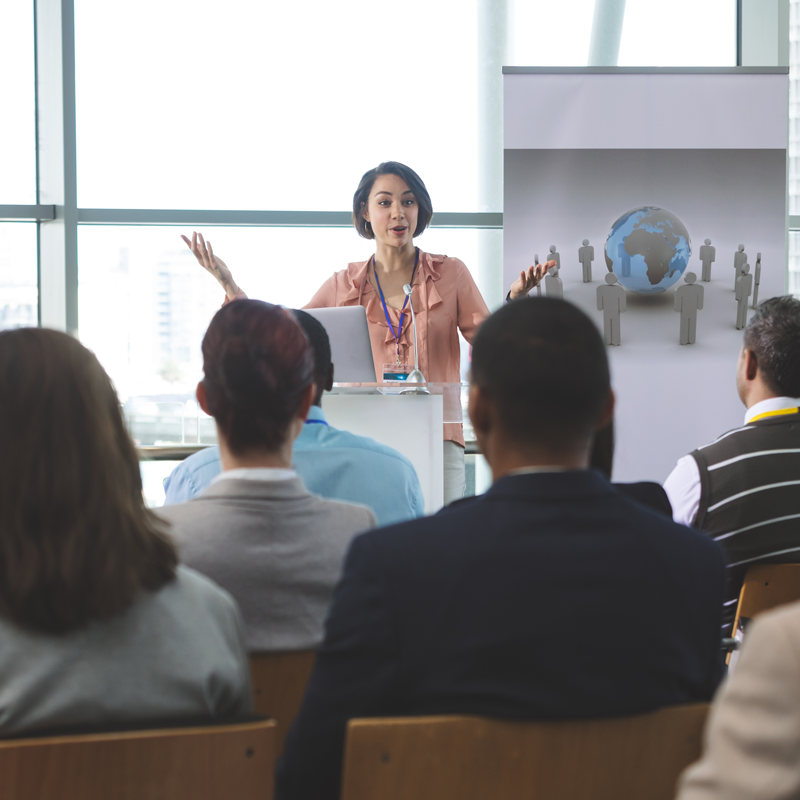 Woman speaking at an event.