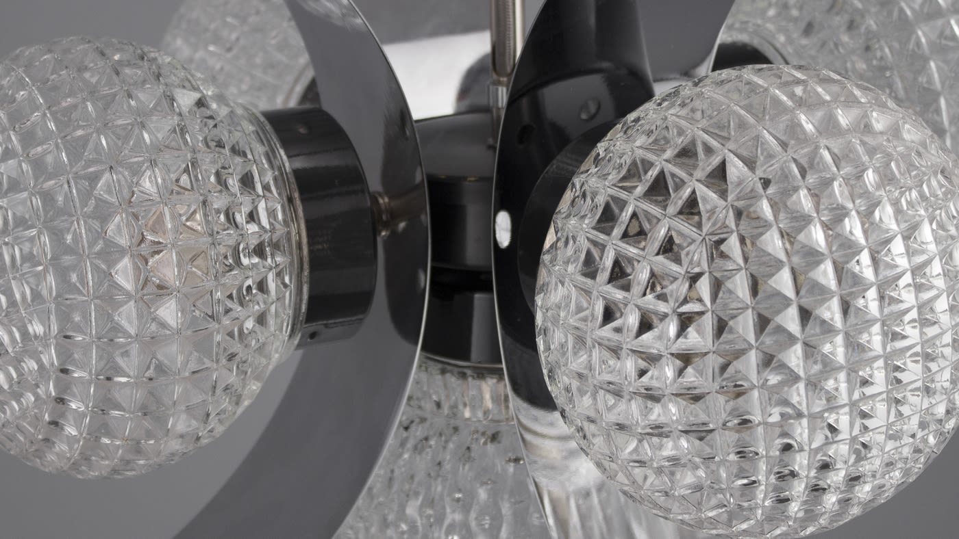 Retro glass ceiling lights and a 1940s copper floor light