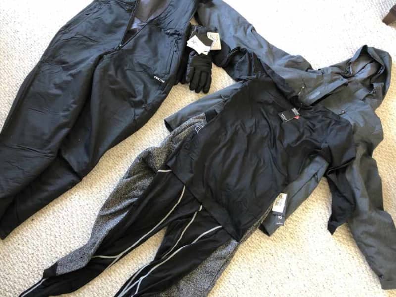 my ski gear laid out on the floor