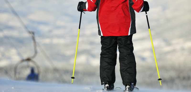 overweight skier from the back overweight skier from the back