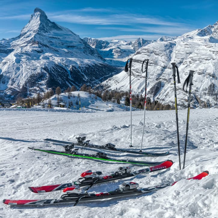 Skis and poles on the snow