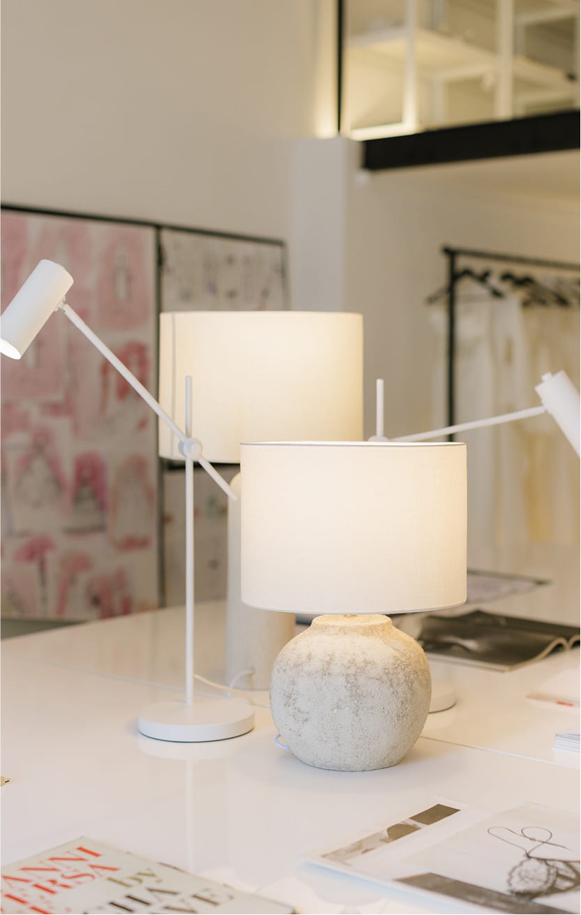 Protea swivel armchair in bouclé fabric