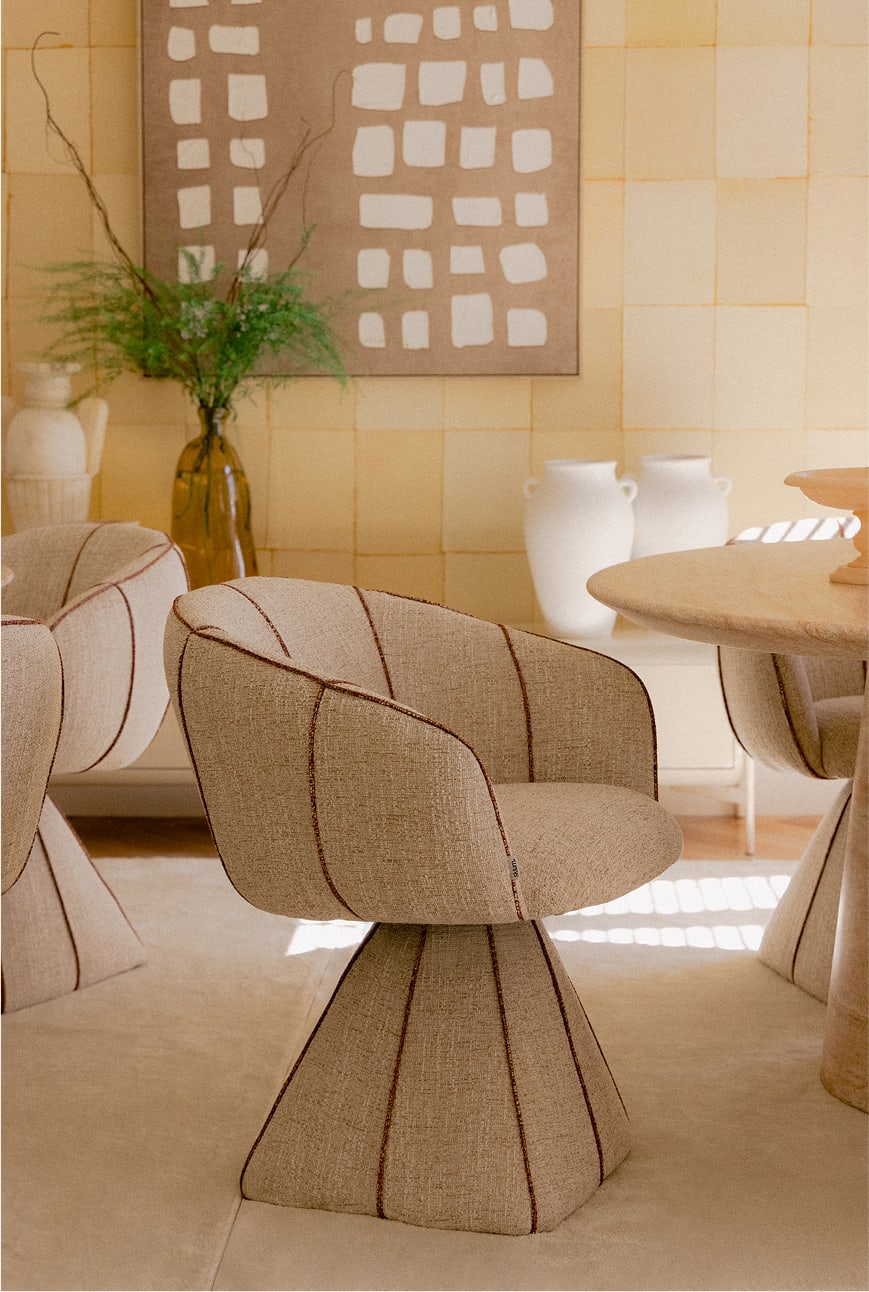 Tallin upholstered swivel dining chair