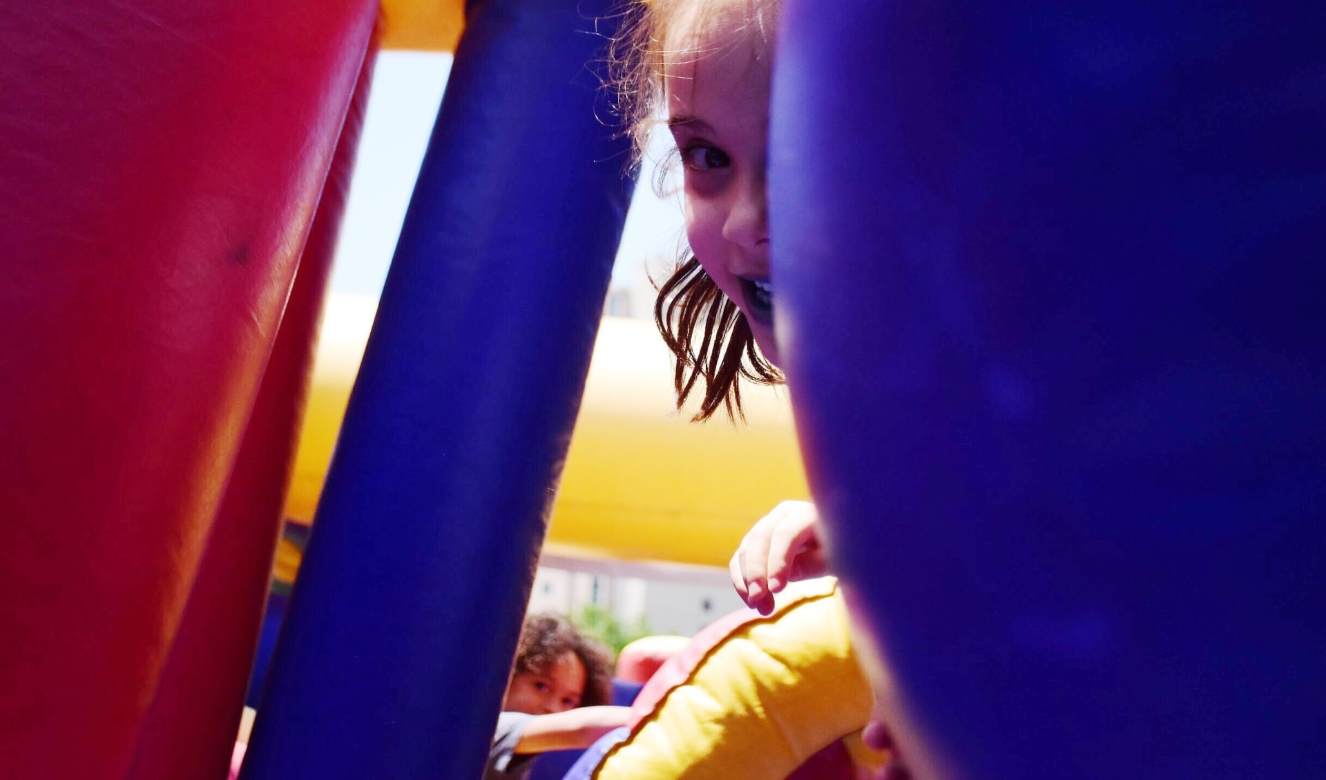 Kids Playing in Inflatable
