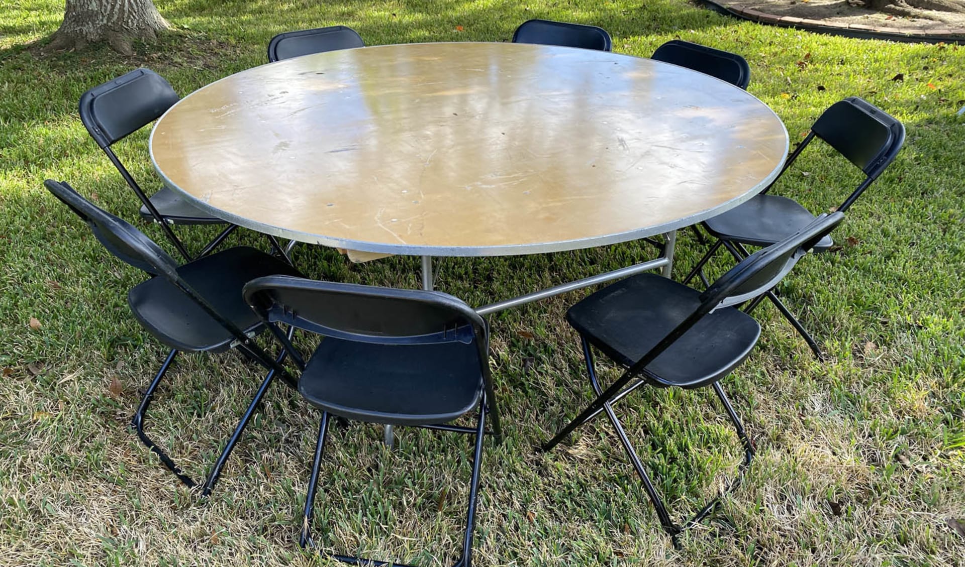 Black Folding Chairs and Wooden Tables