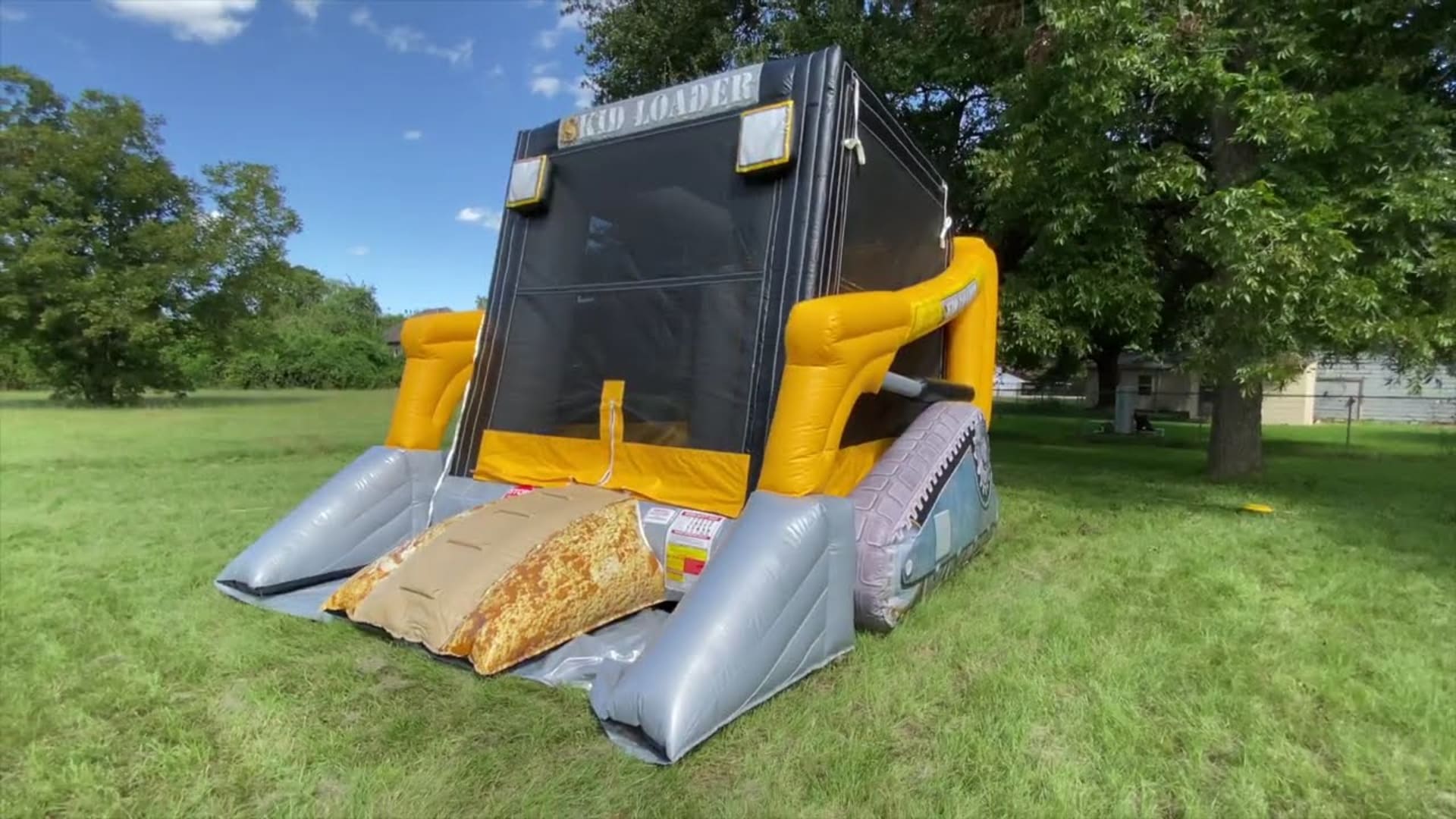 Skid Loader Bounce House - Video