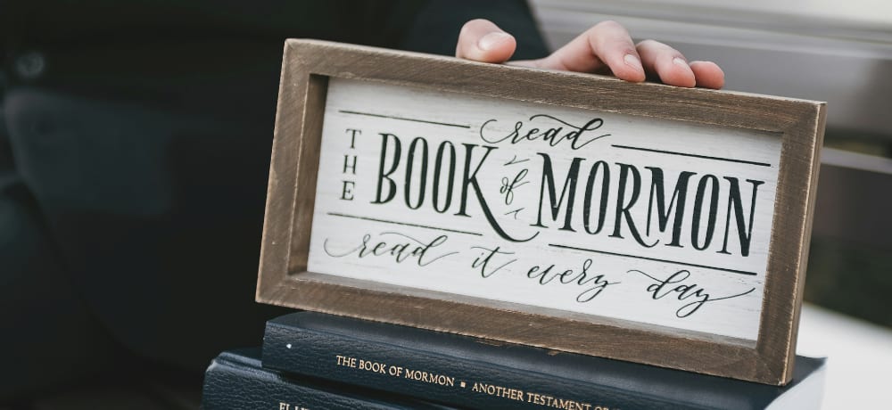sign reading "read the book of mormon; read it every day"