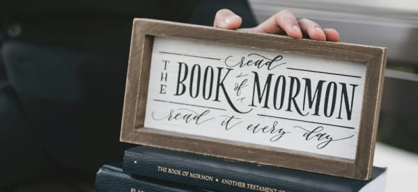 sign reading "read the book of mormon; read it every day"