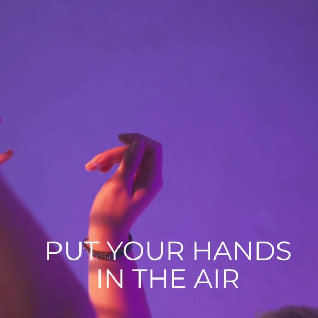 HANDS IN THE AIR at 2 seconds