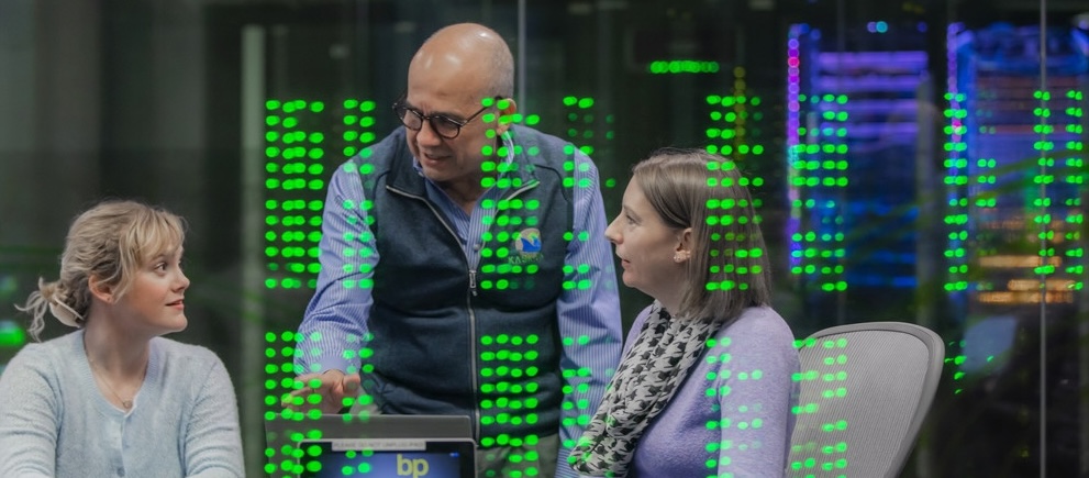 bp employees talking together.