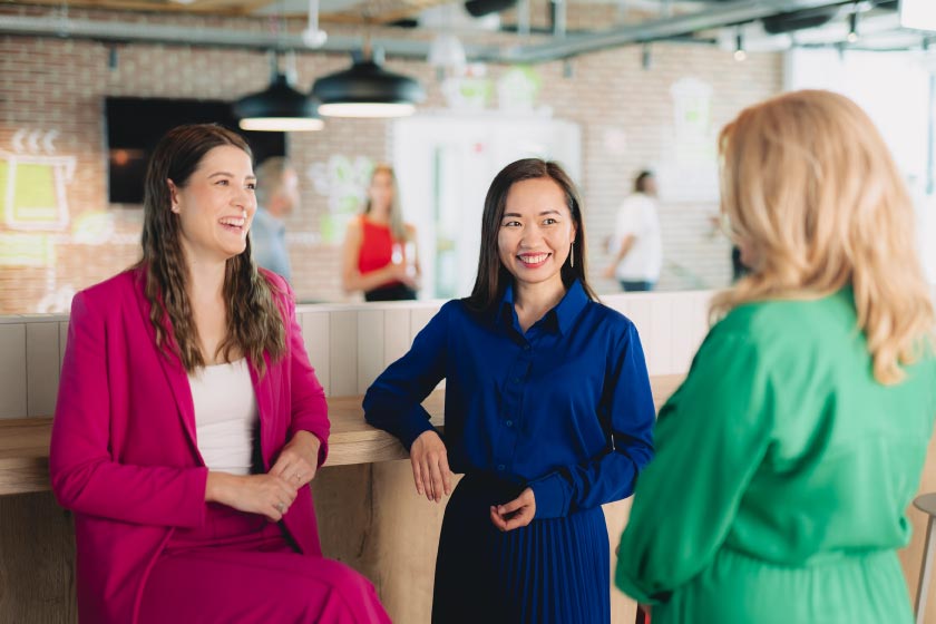 bp employees talking indoors.