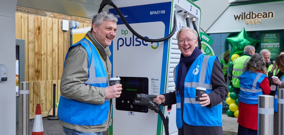 Women talking to the client at the counter.