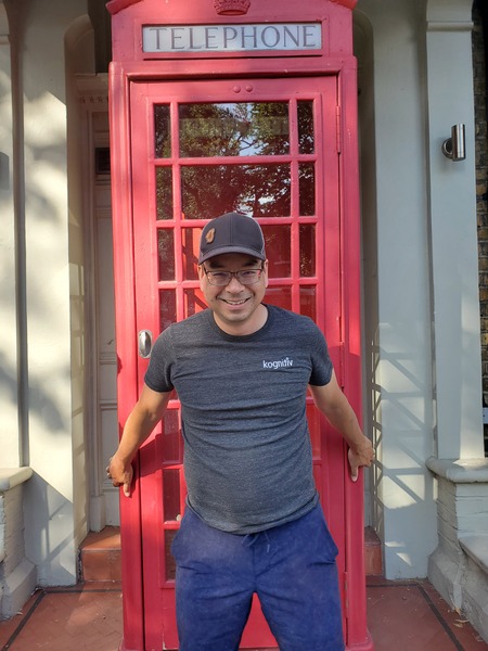 *T-Shirt, Pants, Baseball Cap, Hat, Adult, Male, Man, Person, Glasses, Phone Booth*