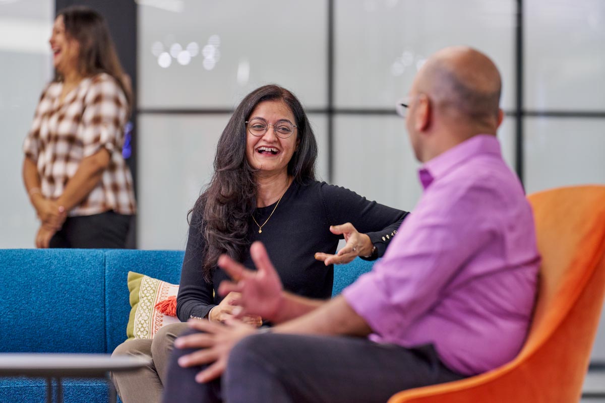 two people talking in the office