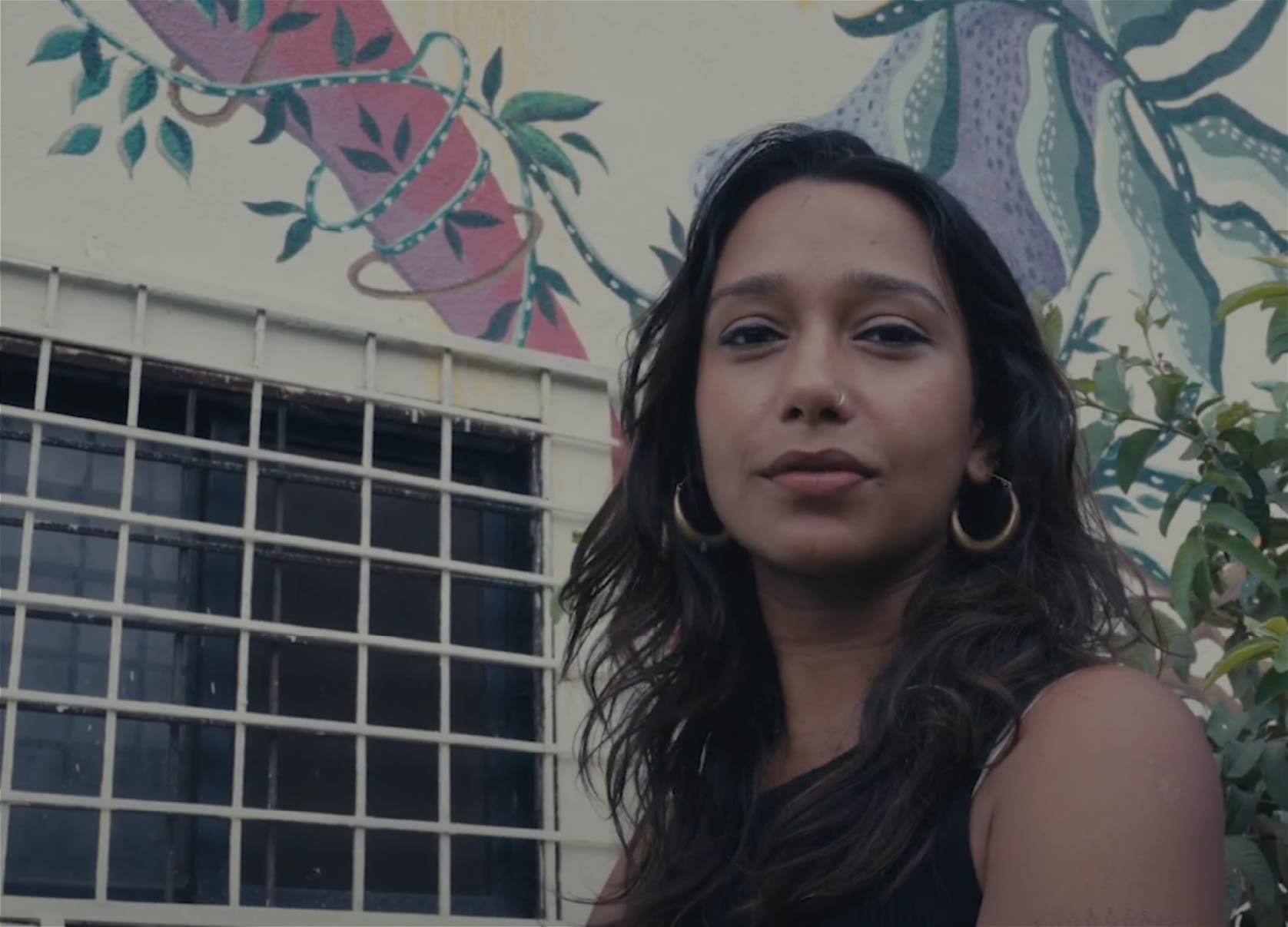 Woman smiling video thumbnail.