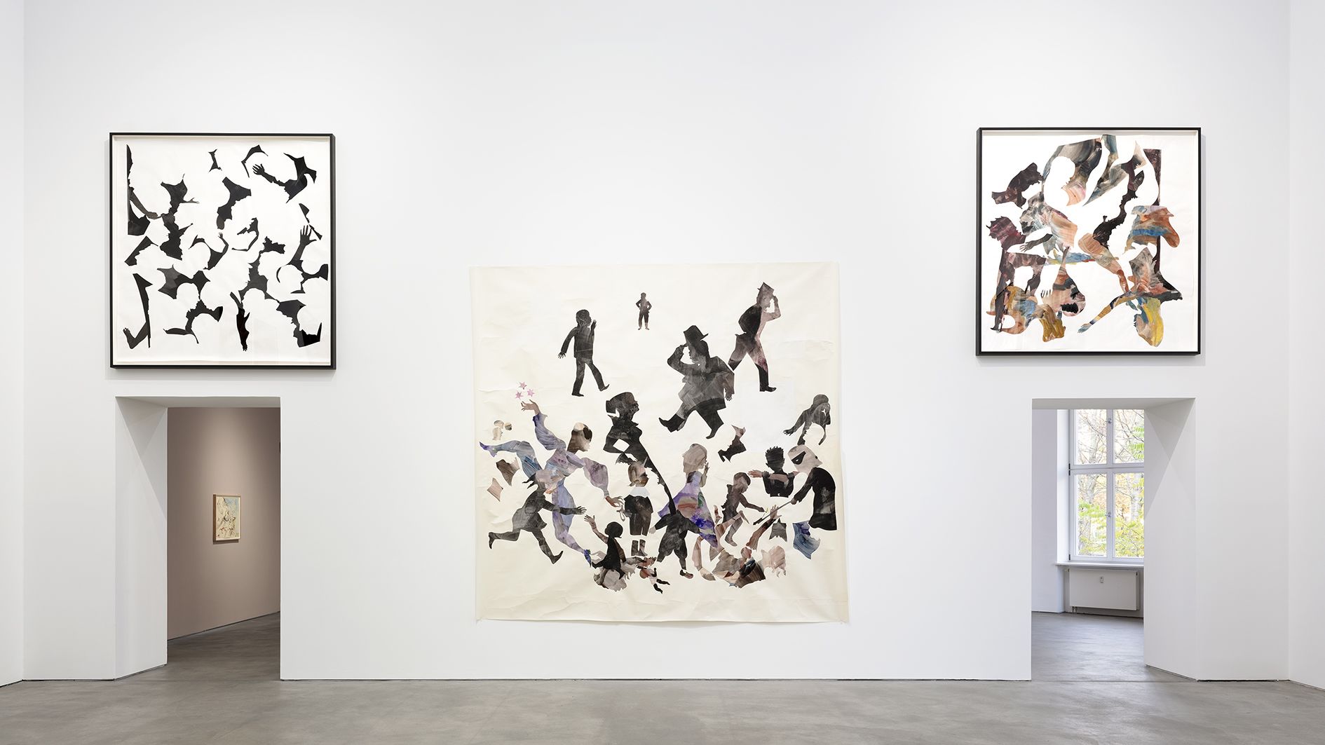 Gallery interior with three artworks: two abstract compositions on side walls and a central painting of multiple figures in dynamic poses.