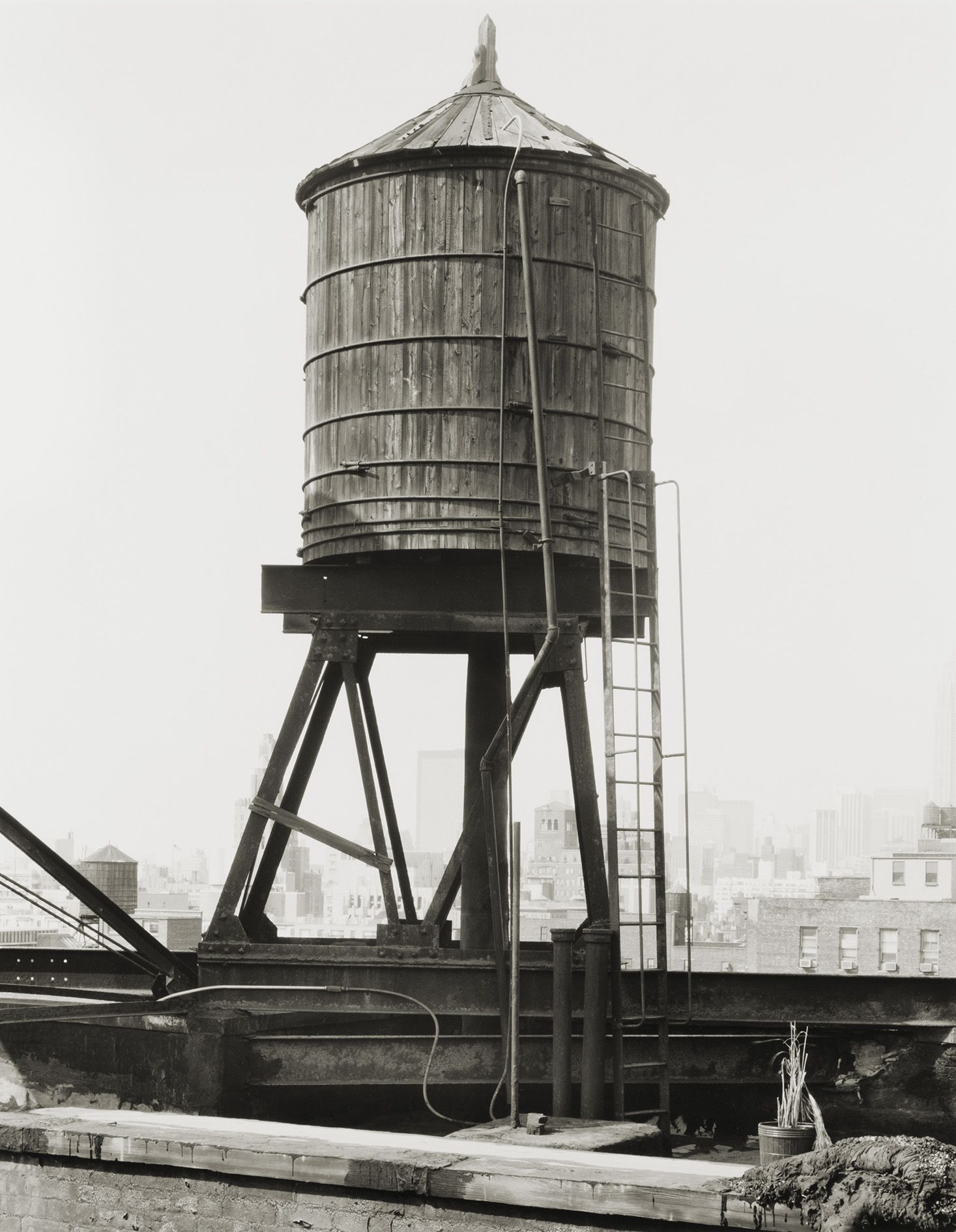 <p><b>Bernd & Hilla Becher<br />
</b><i>Water Tower, Broadway/Houston St., New York City, USA</i>, 1978<br />
Silver gelatin print<br />
60 × 50 cm | 23 5/8 × 19 3/4 inches<br />
91.5 × 75 cm | 36 × 29 1/2 inches (framed)<br />
Edition of 5</p>