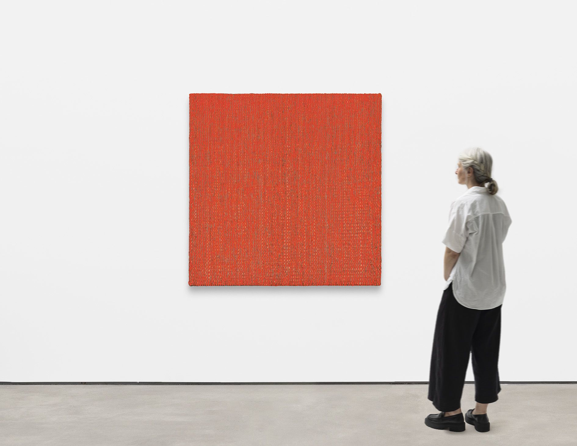 <p><b>Analia Saban<br />
</b><i>Woven Paint (Fluorescent Orange)</i>, 2025<br />
Woven acrylic paint and linen thread on panel<br />
146.1 × 146.1 × 5.7 cm | 57 1/2 × 57 1/2 × 2 1/4 inches</p>