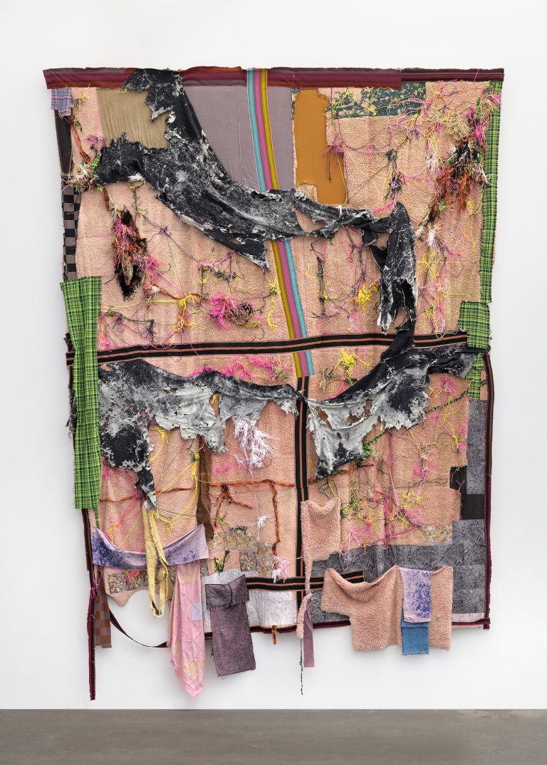 Sterling Ruby
QUILT (7807), 2022
Bleached canvas, elastic, faux shearling, fabric remnants, decals, and yarn
683.3 &times; 492.8 &times; 30.5 cm
269 &times; 194 &times; 12 inches